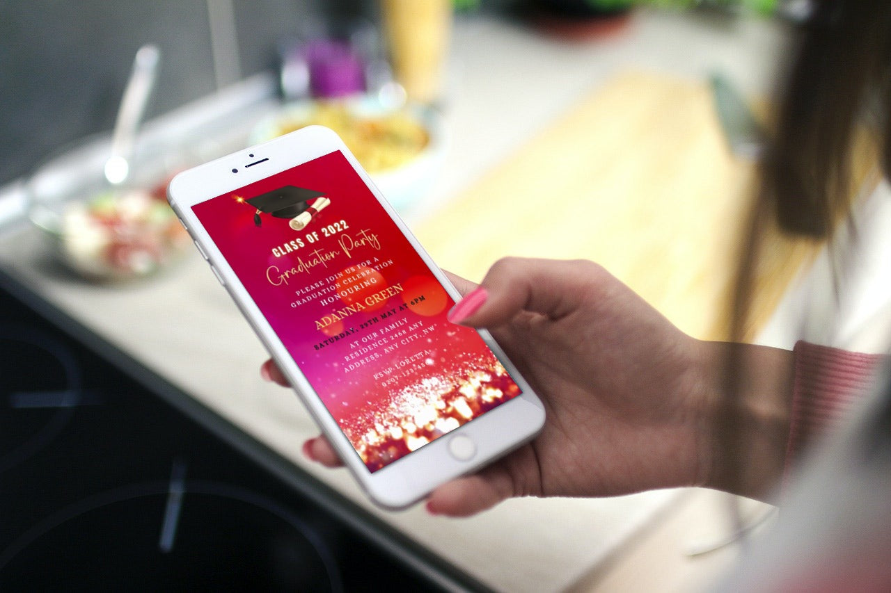 Hand holding a smartphone displaying a customizable Fuchsia Gold Glitter Graduation Video Invitation template from URCordiallyInvited.