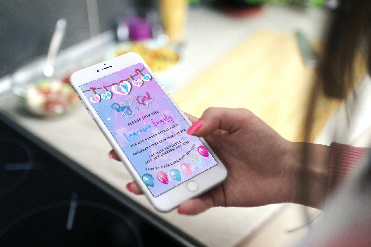 Hand holding a smartphone displaying a customizable Pink Blue Sky Hearts Gender Reveal Party Video Invitation from URCordiallyInvited.