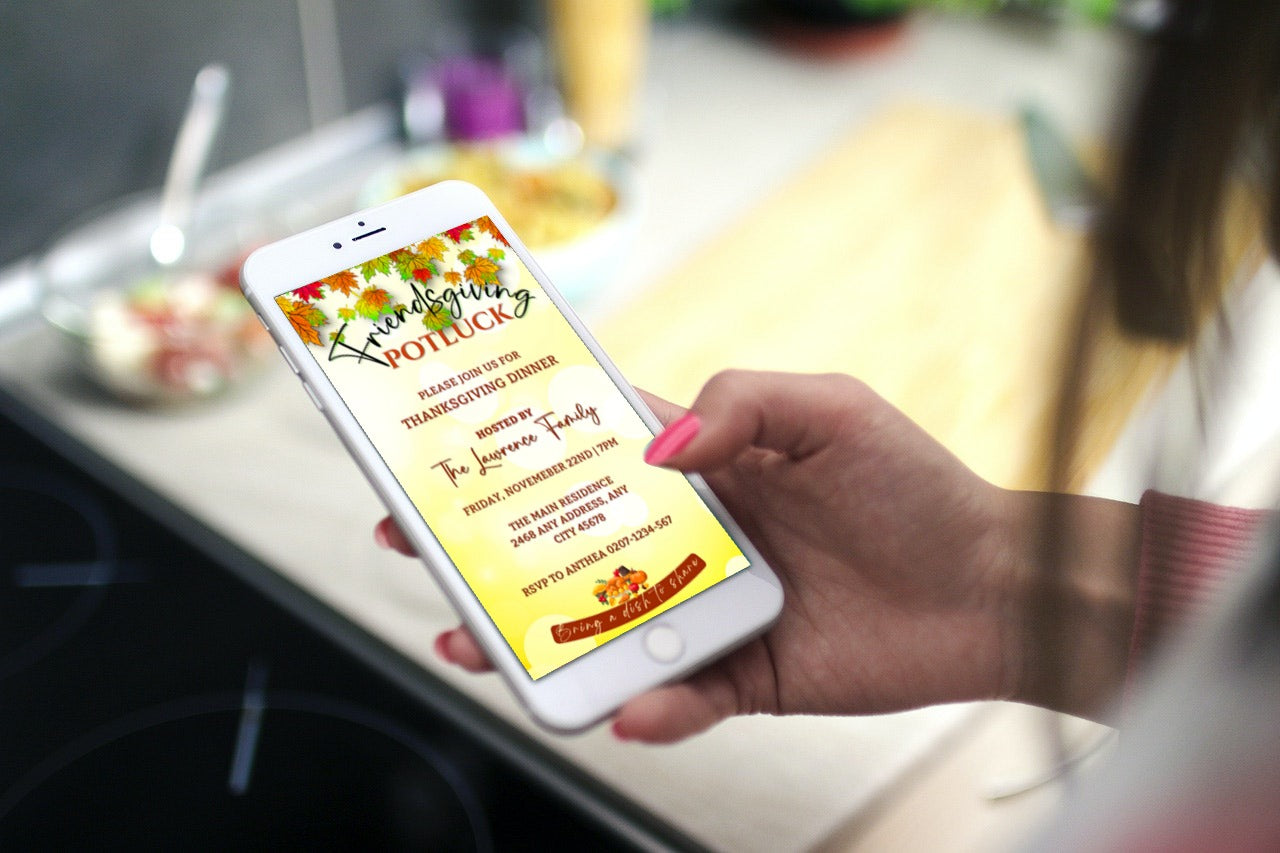 Hand holding a phone displaying a Friendsgiving Potluck Autumn Leaves Thanksgiving Dinner Evite, customizable via Canva for electronic sharing.