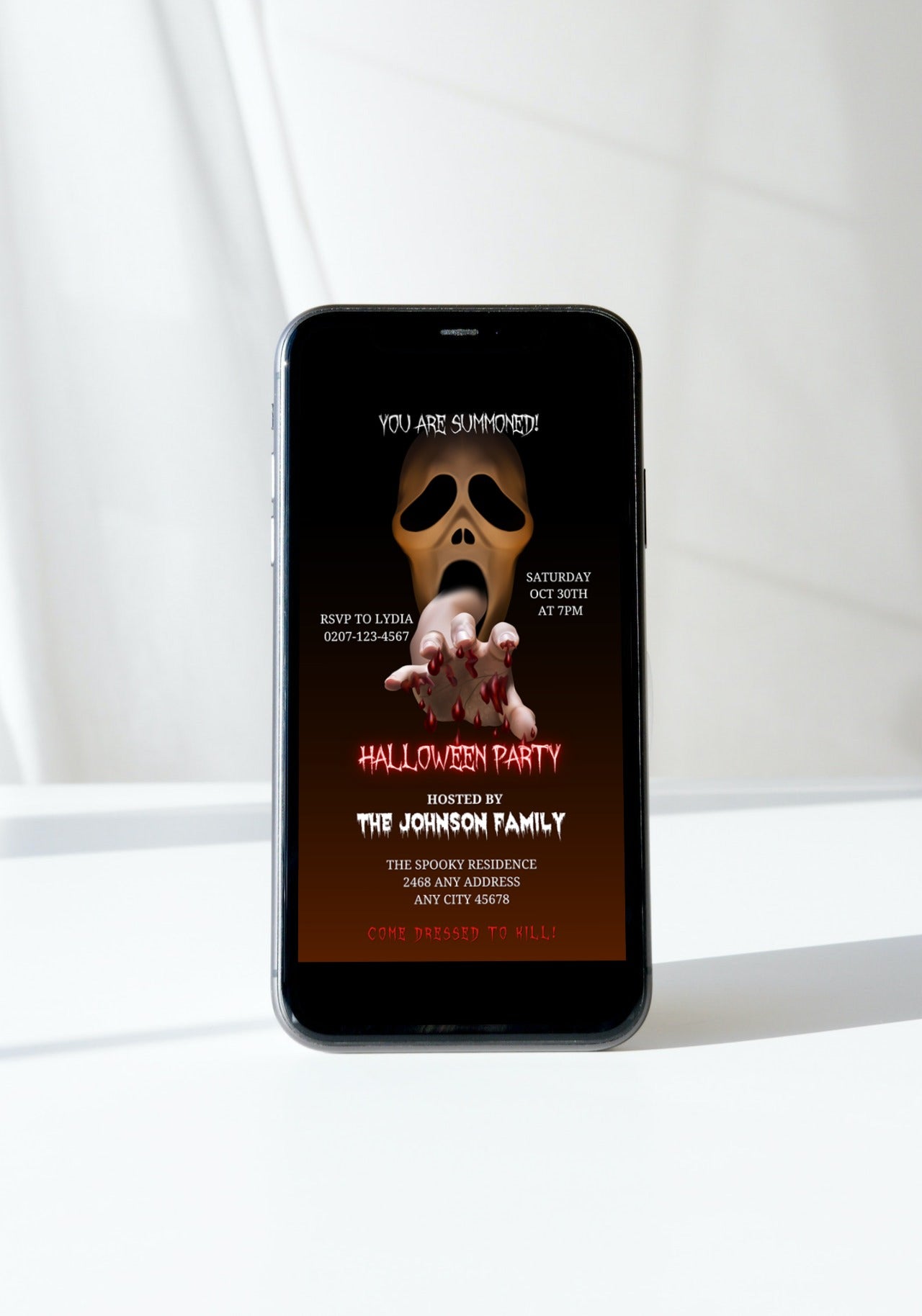 Scary Mouth Hand Skull Halloween Evite displaying a cell phone screen with a skull and bloodied hand, customizable via Canva for electronic invitations.