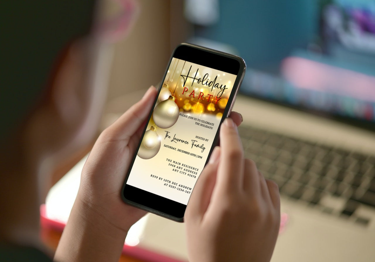 Hand holding a smartphone displaying a customizable digital Christmas party invitation with gold beige glitter ornament design.
