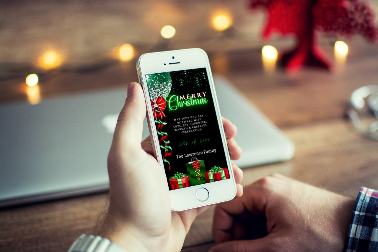 A person holding a smartphone displaying the Green Neon Presents & Red Green Balloon | Merry Christmas Ecard, ready for customization and digital sharing.