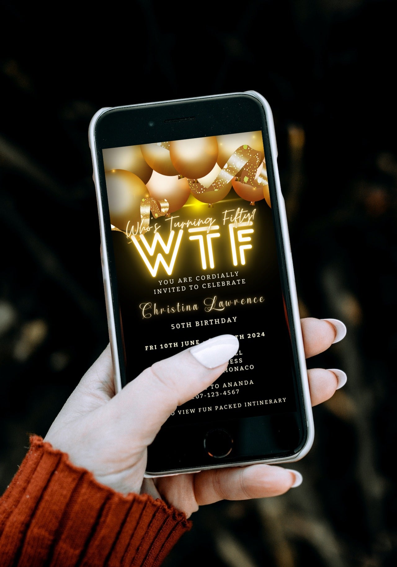 Hand holding a smartphone displaying a customizable Black Neon Gold Floating Balloons | WTFifty Weekend Evite invitation template.