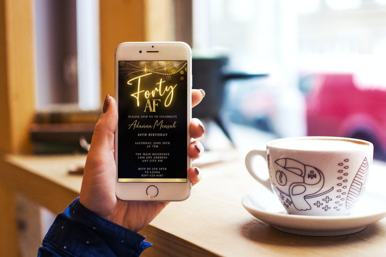 Hand holding a phone displaying the Black Gold Neon Sparkle | 40AF Birthday Evite customizable invitation template from URCordiallyInvited.