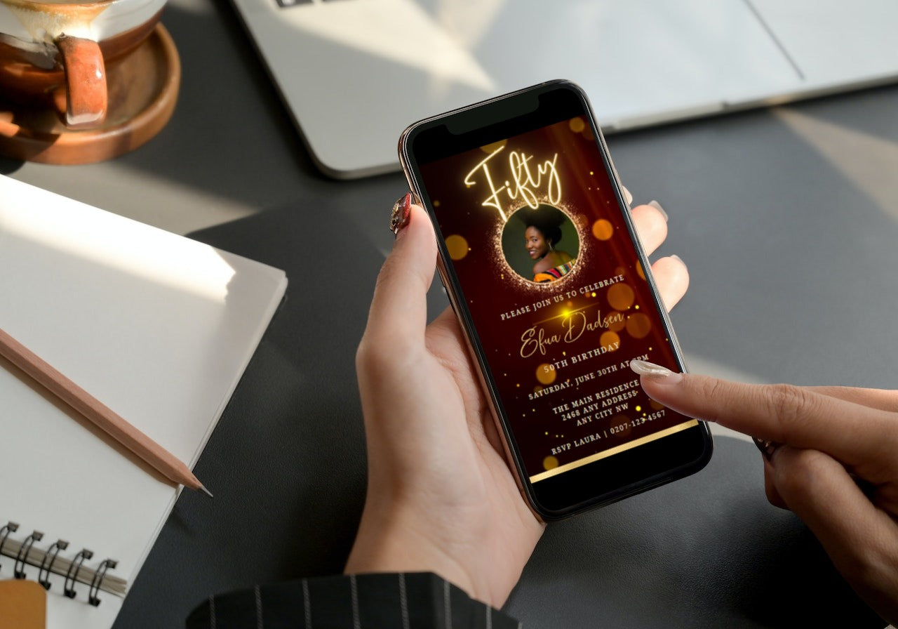 Person holding a phone displaying a customisable Maroon Gold Neon 50th Birthday Video Invitation template for editing via Canva.