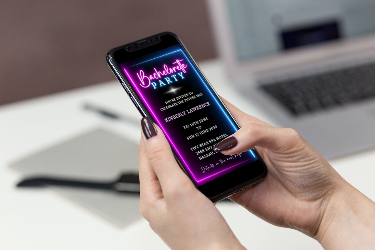 Person holding a smartphone displaying a customizable Neon Blue Pink Disco Bachelorette Video Invitation.