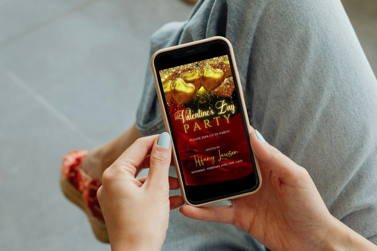 Person holding a smartphone displaying a Red Silk Neon Gold Heart Balloons Valentine's Party Invite template, ready for customization in Canva.