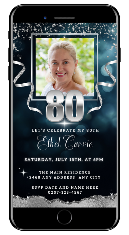 Navy Blue Silver Glitter 80th Birthday Evite displayed on a smartphone screen, featuring a smiling woman’s photo for customizable digital invitations.