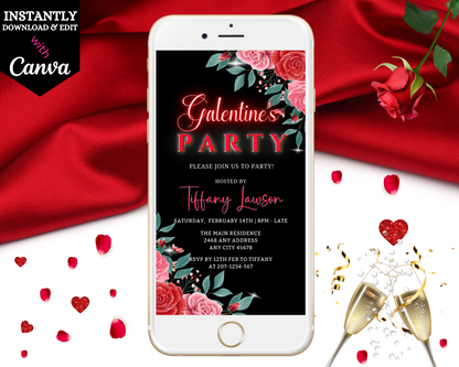 Smartphone displaying editable Red Teal Floral Rose Galentines Party Evite template, surrounded by red roses and a red cloth, ready for customization in Canva.