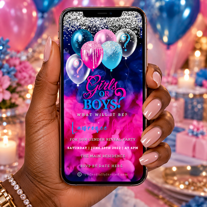 A hand holding a phone displaying a twins gender reveal digital invitation featuring blue and pink ink-splatter balloons.