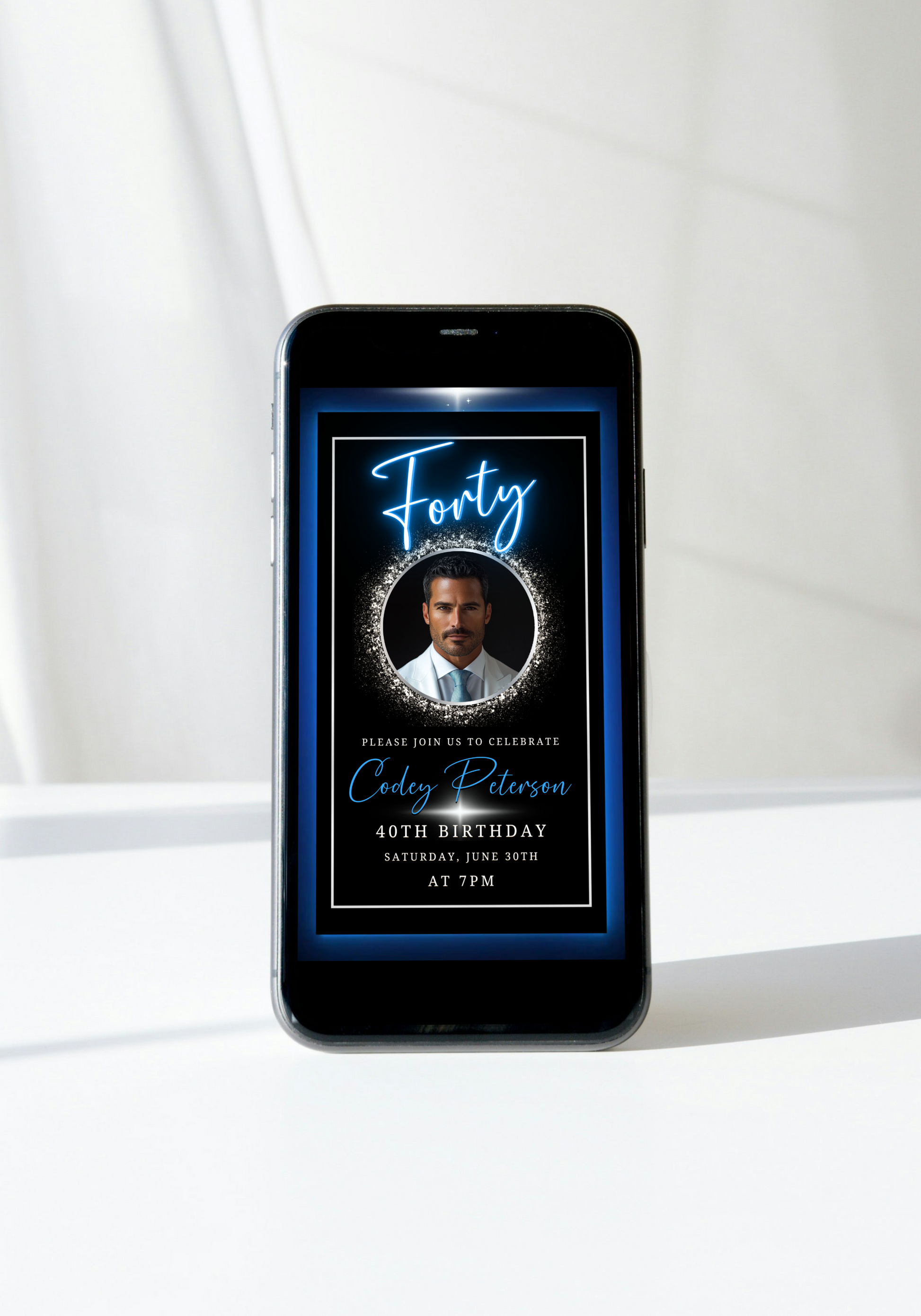 Blue & Silver 40th Birthday Video Invitation featuring a man's face on a cell phone screen, with an elegant oval gold frame, ideal for milestone celebrations.