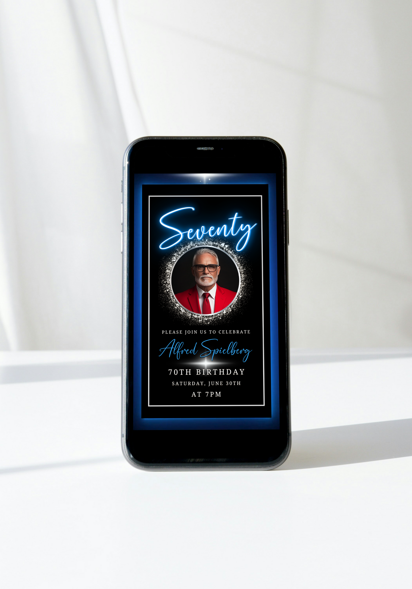 70th Birthday Video Invitation with a man's photo on a cell phone screen, featuring a gold oval frame and sleek neon red and gold border.