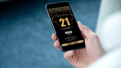 A hand holding a smartphone displaying the customizable Black Gold Confetti 21st Birthday Evite from URCordiallyInvited.