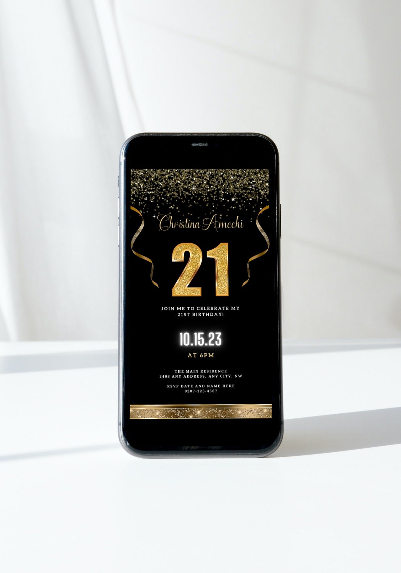 Customizable Digital Black Gold Confetti 21st Birthday Evite displayed on a smartphone screen, featuring celebratory gold text and confetti design elements.