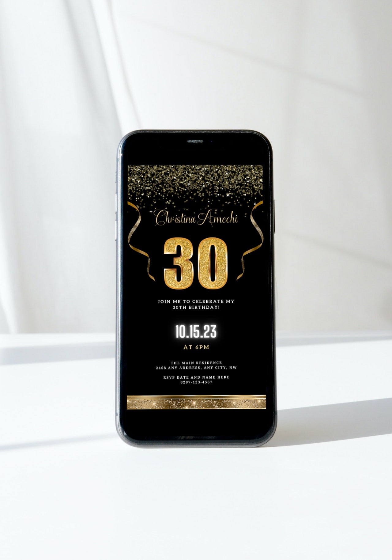 Customizable Digital Black Gold Confetti 30th Birthday Evite displayed on a smartphone screen with gold text and confetti.