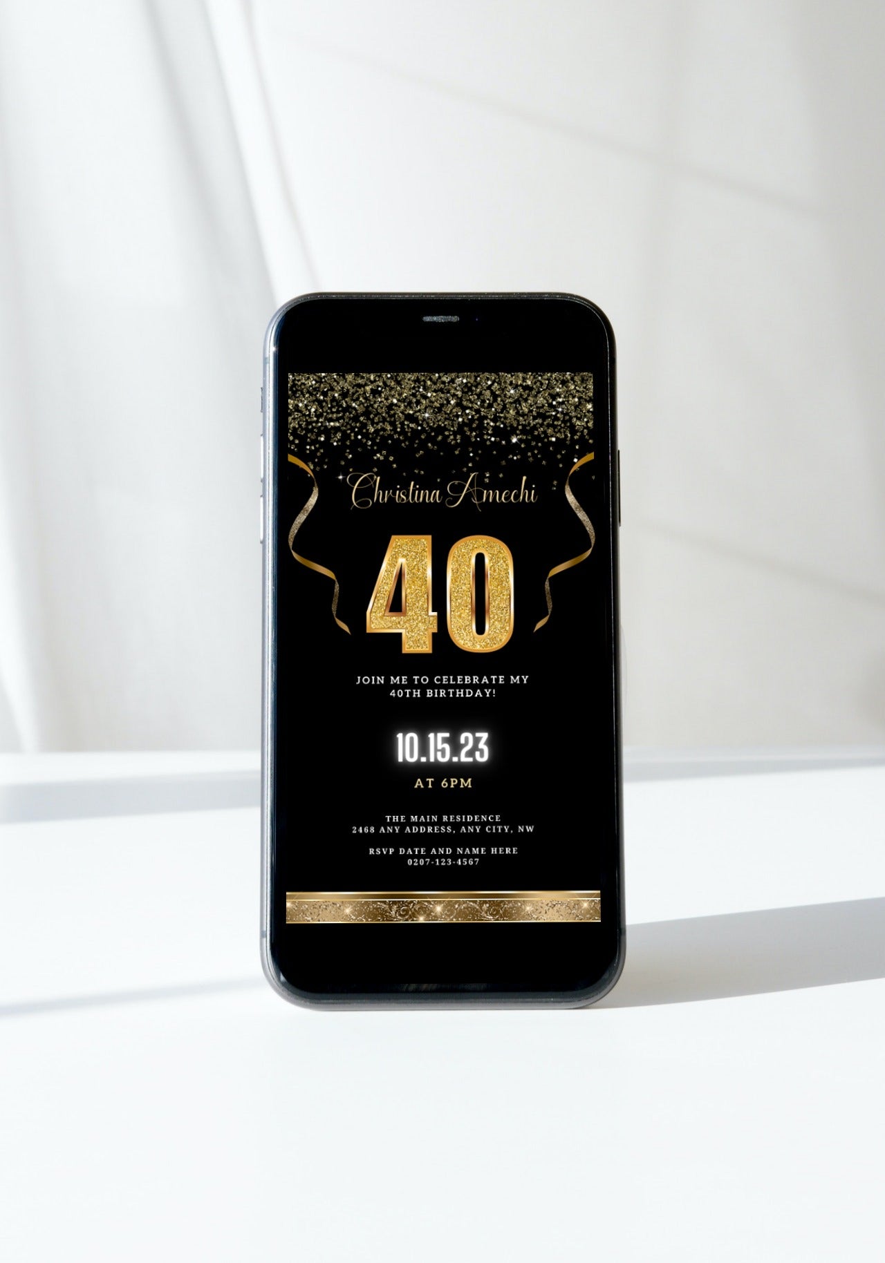 Digital Black Gold Confetti 40th Birthday Evite displayed on a smartphone, featuring customizable gold text and confetti design for electronic invitations.