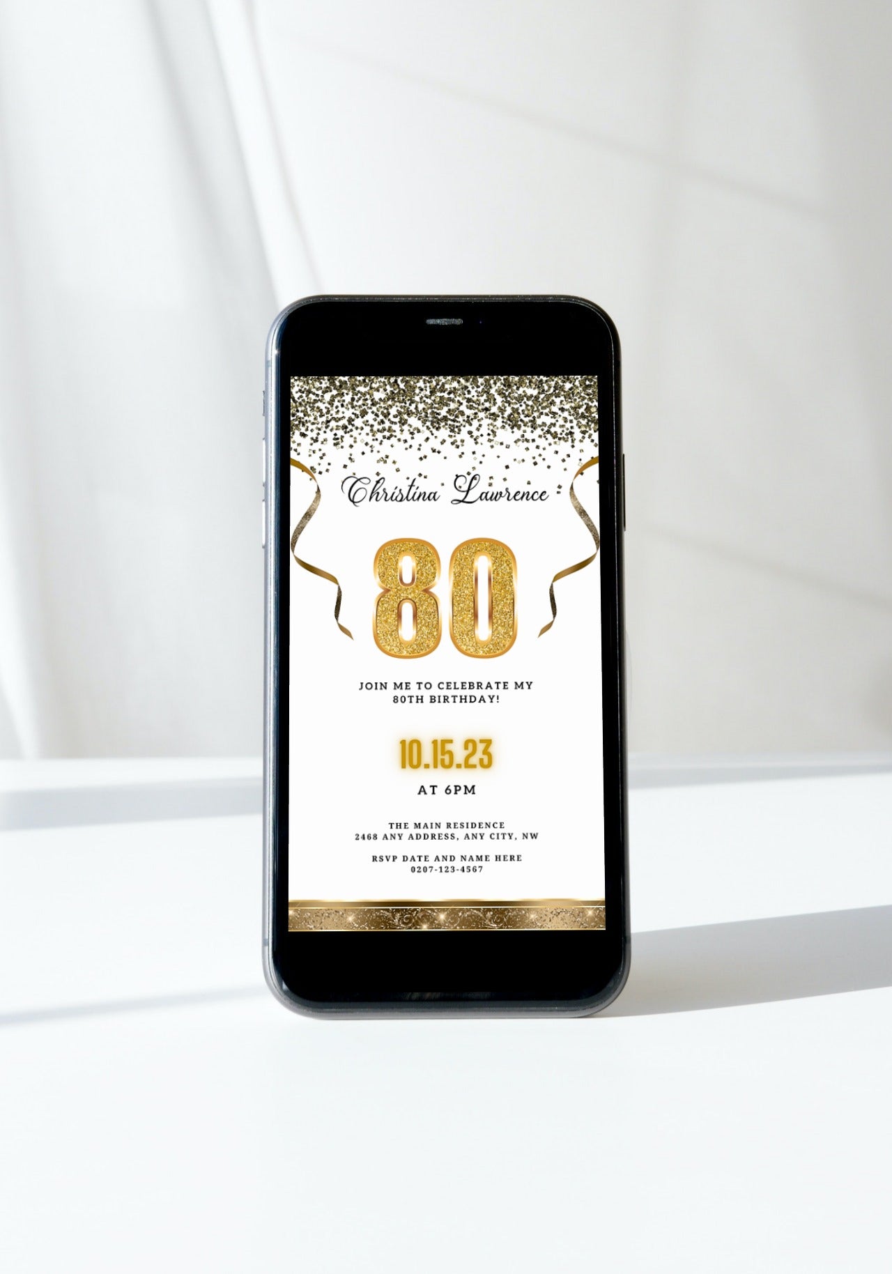 Customisable White Gold Confetti 80th Birthday Evite displayed on a smartphone screen, ready to personalize and share via Canva.