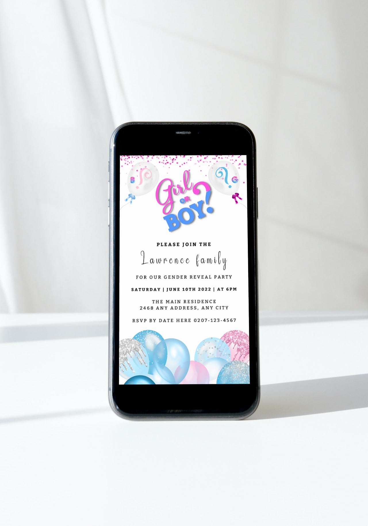 Smartphone displaying a customizable digital invitation for a gender reveal party, featuring blue and pink balloons and editable text options.