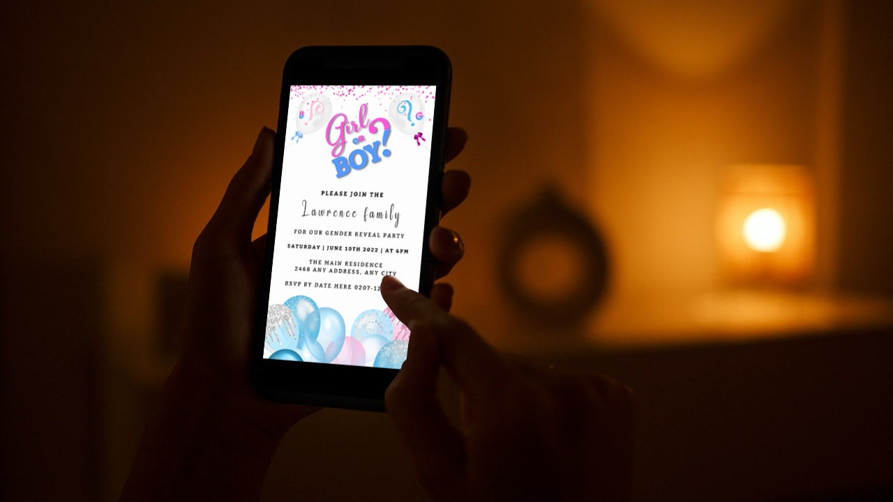 Person holding a smartphone displaying a customizable Gender Reveal Party Evite titled Blue Pink Boy Or Girl Balloons.