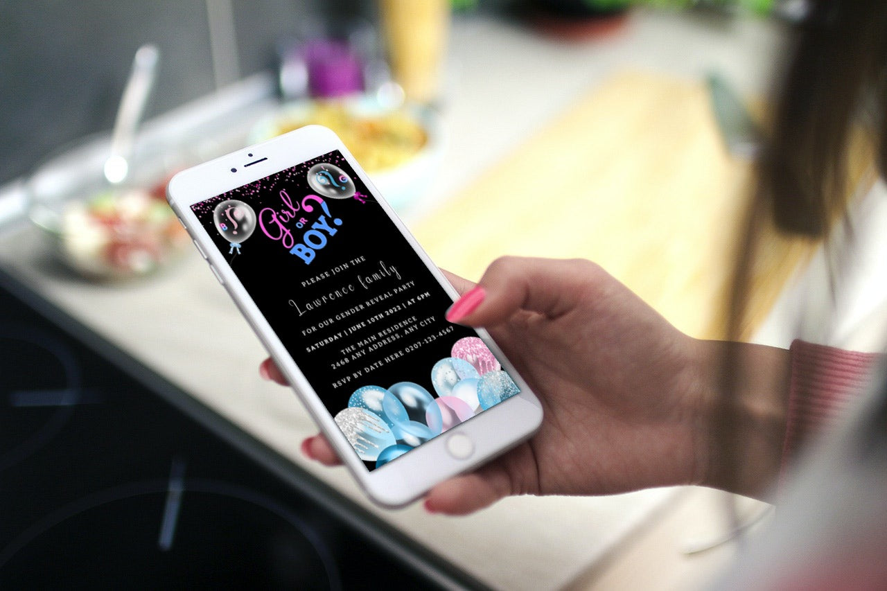 Hand holding a smartphone displaying a customizable Gender Reveal Evite template titled Black Blue Pink Boy Or Girl Balloons.