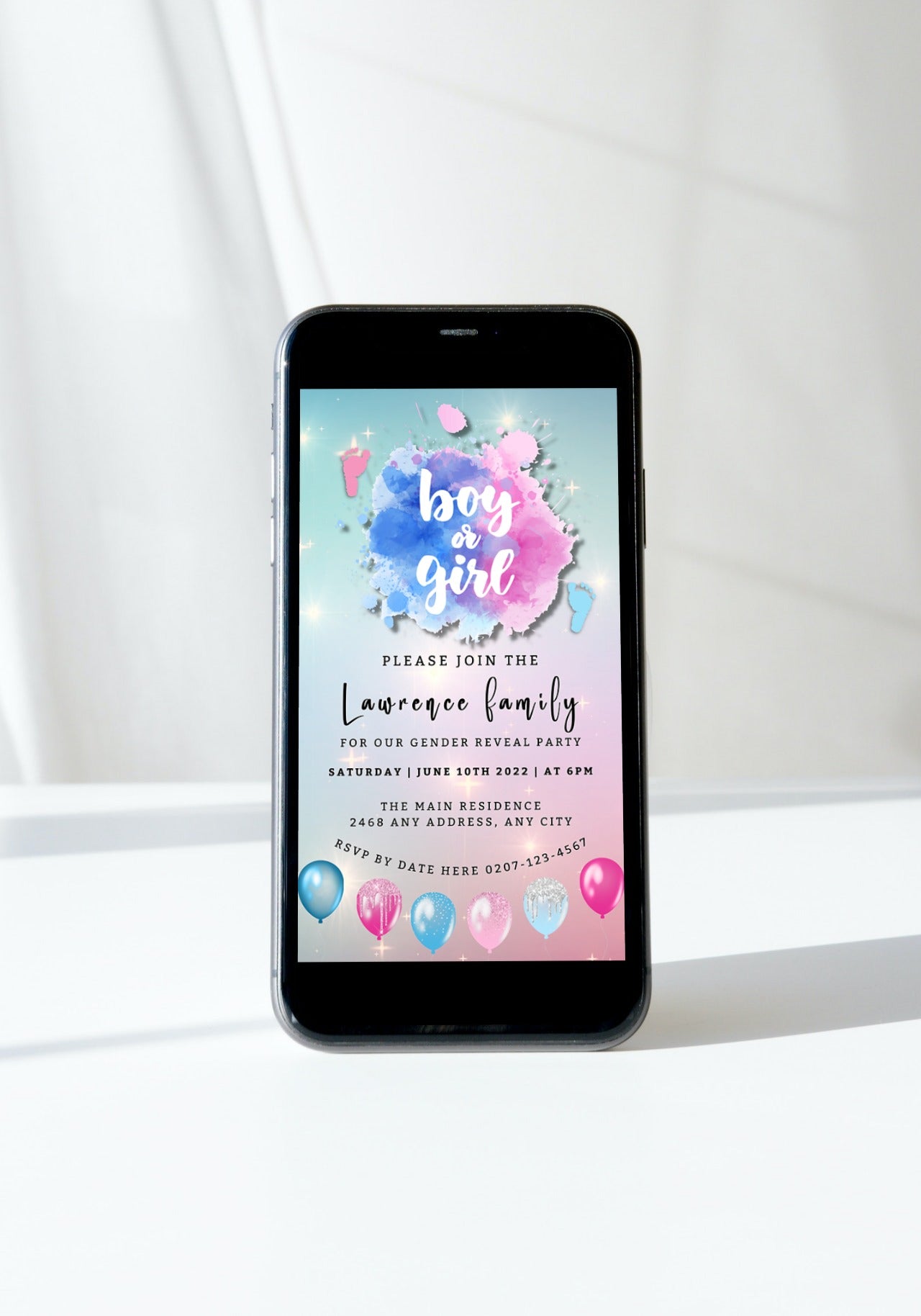 Smartphone displaying a customizable digital invitation template for a gender reveal event from URCordiallyInvited, featuring pink and blue sparkle feet cloud design.