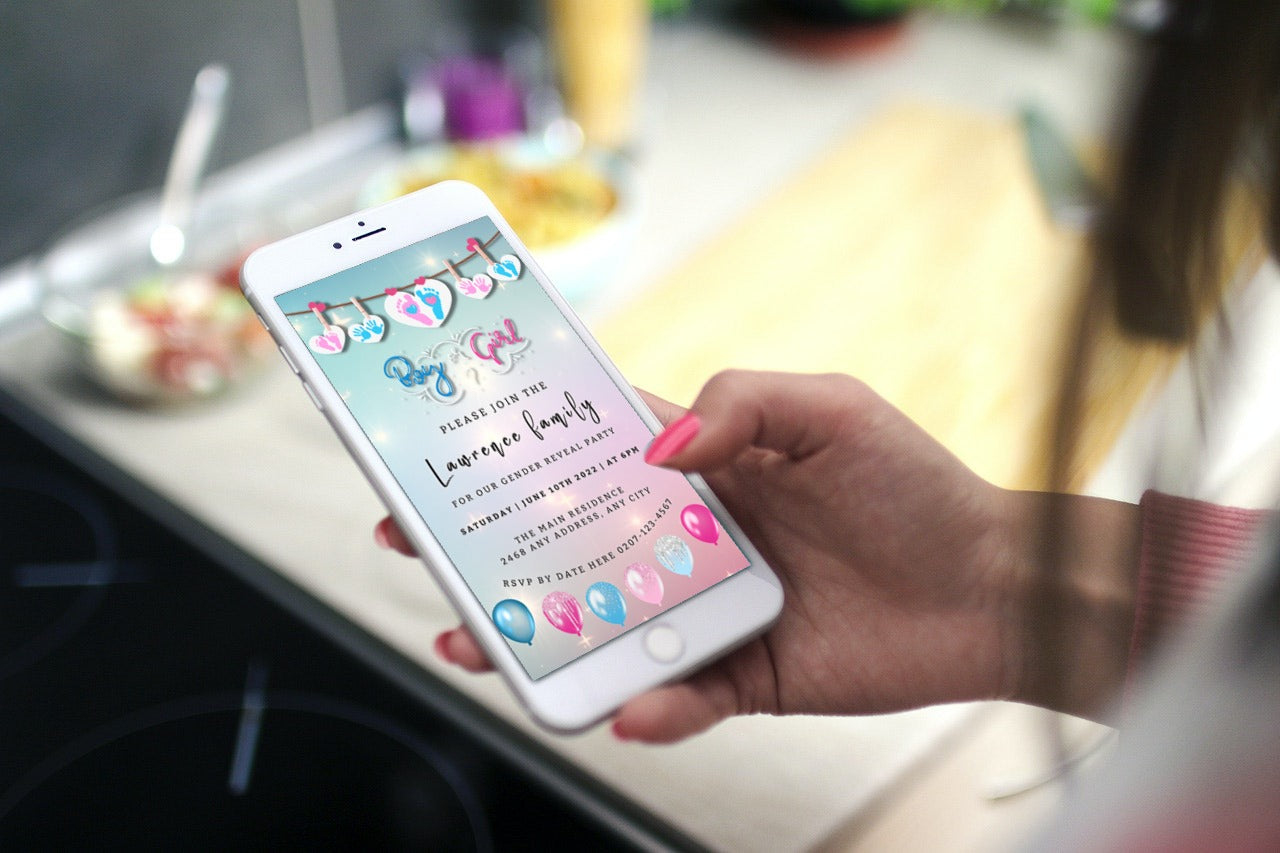 Hand holding a cell phone displaying a customizable Sparkling Hanging Hearts Gender Reveal Evite template for DIY editing via Canva.
