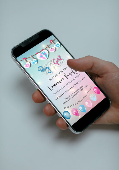 Hand holding a smartphone displaying the customizable Sparkling Hanging Hearts Gender Reveal Evite from URCordiallyInvited, ready for personalization via Canva.