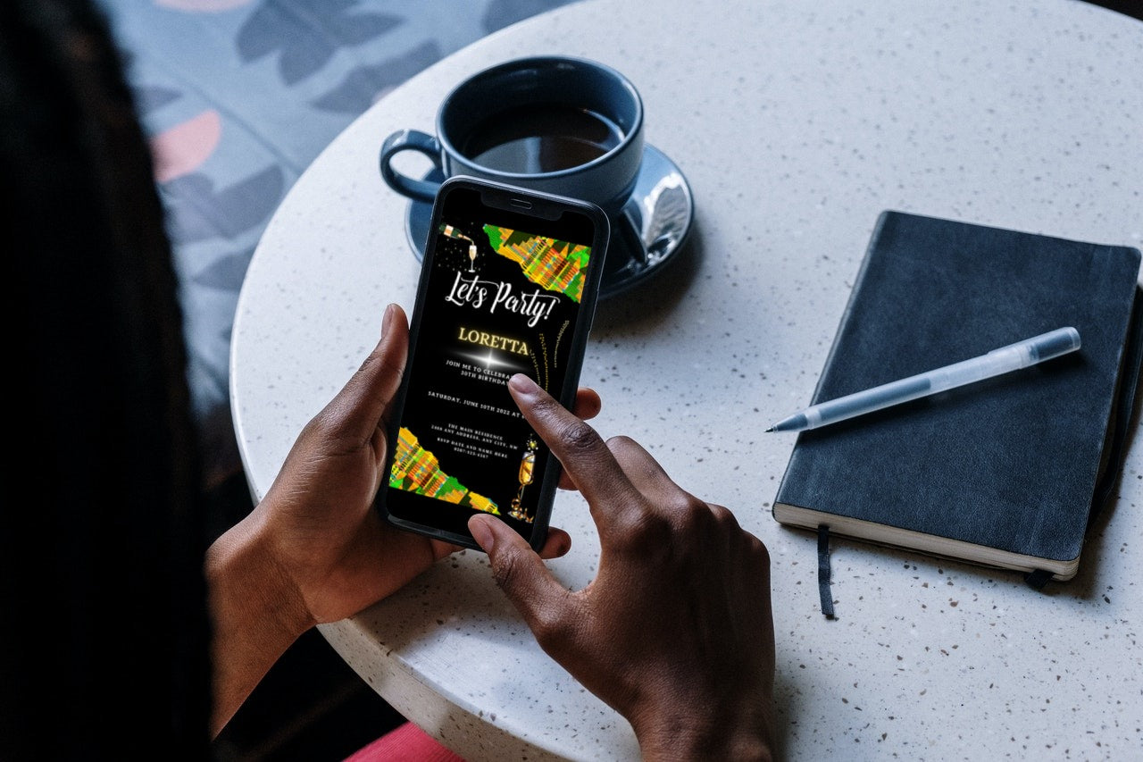 Person holding a phone displaying an editable Green Yellow African Kente Birthday Party Evite template from URCordiallyInvited.