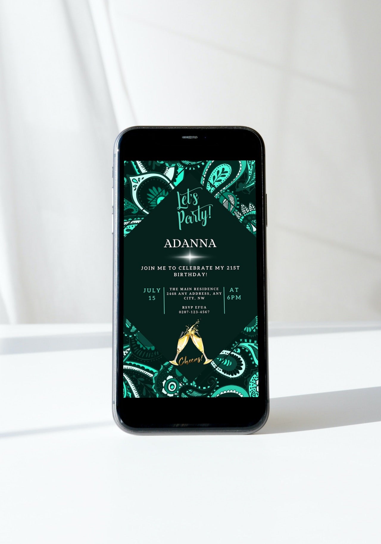 Green White African Ankara Editable Party Evite displayed on a smartphone screen, accompanied by champagne glasses, showcasing customizable digital invitation features.
