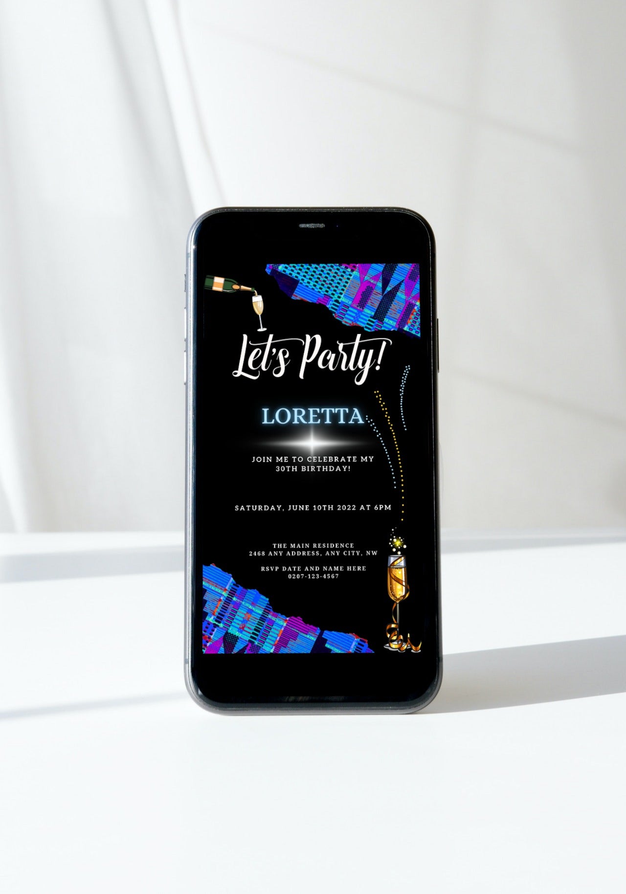 Editable Blue Purple African Kente Birthday Party Evite displayed on a smartphone, showcasing customization options for text, font, and images.