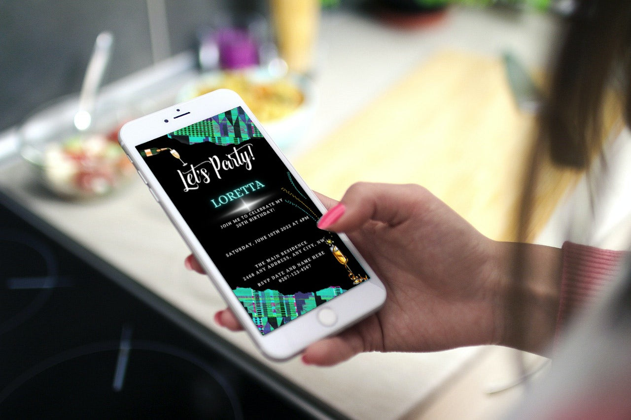 Hand holding a phone displaying the Teal Black African Kente customizable party evite template from URCordiallyInvited.