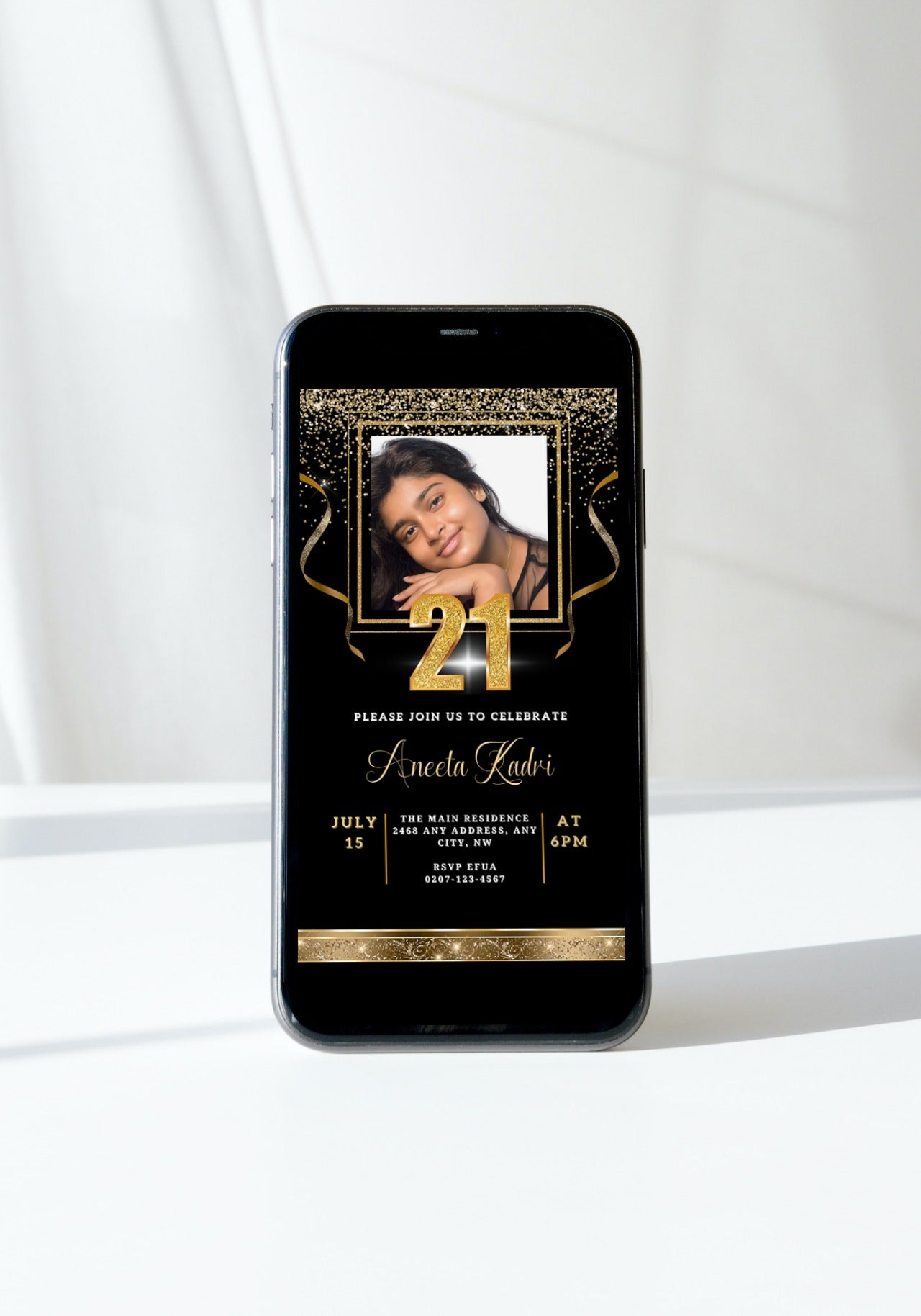 Cell phone displaying customizable Black Gold Confetti Photo | 21st Birthday Evite, featuring a smiling girl’s photo, ideal for electronic invitations via Canva.