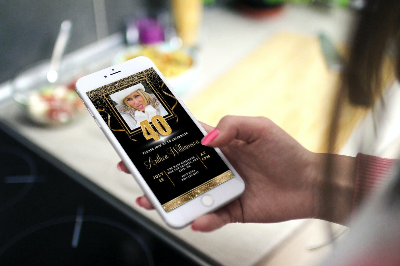 Hand holding a phone displaying a customizable Black Gold Confetti 40th Birthday Evite with a woman's photo.