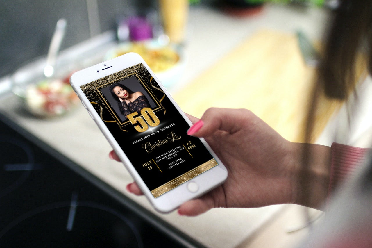 Hand holding a smartphone displaying a customizable Black Gold Confetti with Photo 50th Birthday Evite.