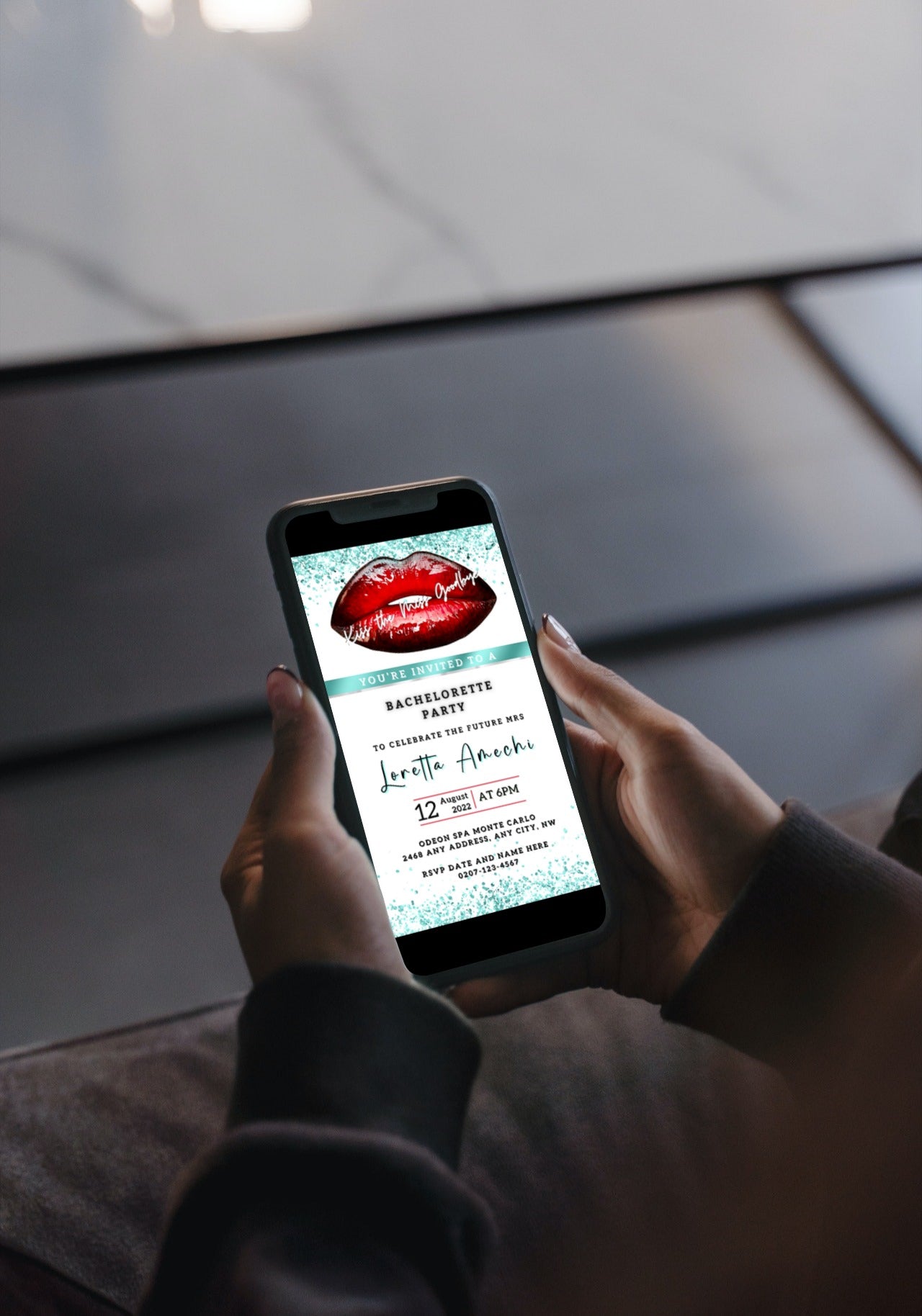 Person holding a phone displaying a customizable Red Hot Lips White Teal Glitter Bachelorette Party Evite for editing and sharing via smartphone.