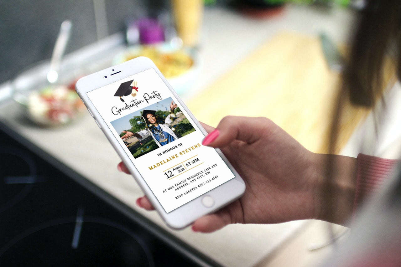 A hand holds a phone displaying the White & Gold Graduation Invitation with a glittering cap design, perfect for celebrating academic achievements.