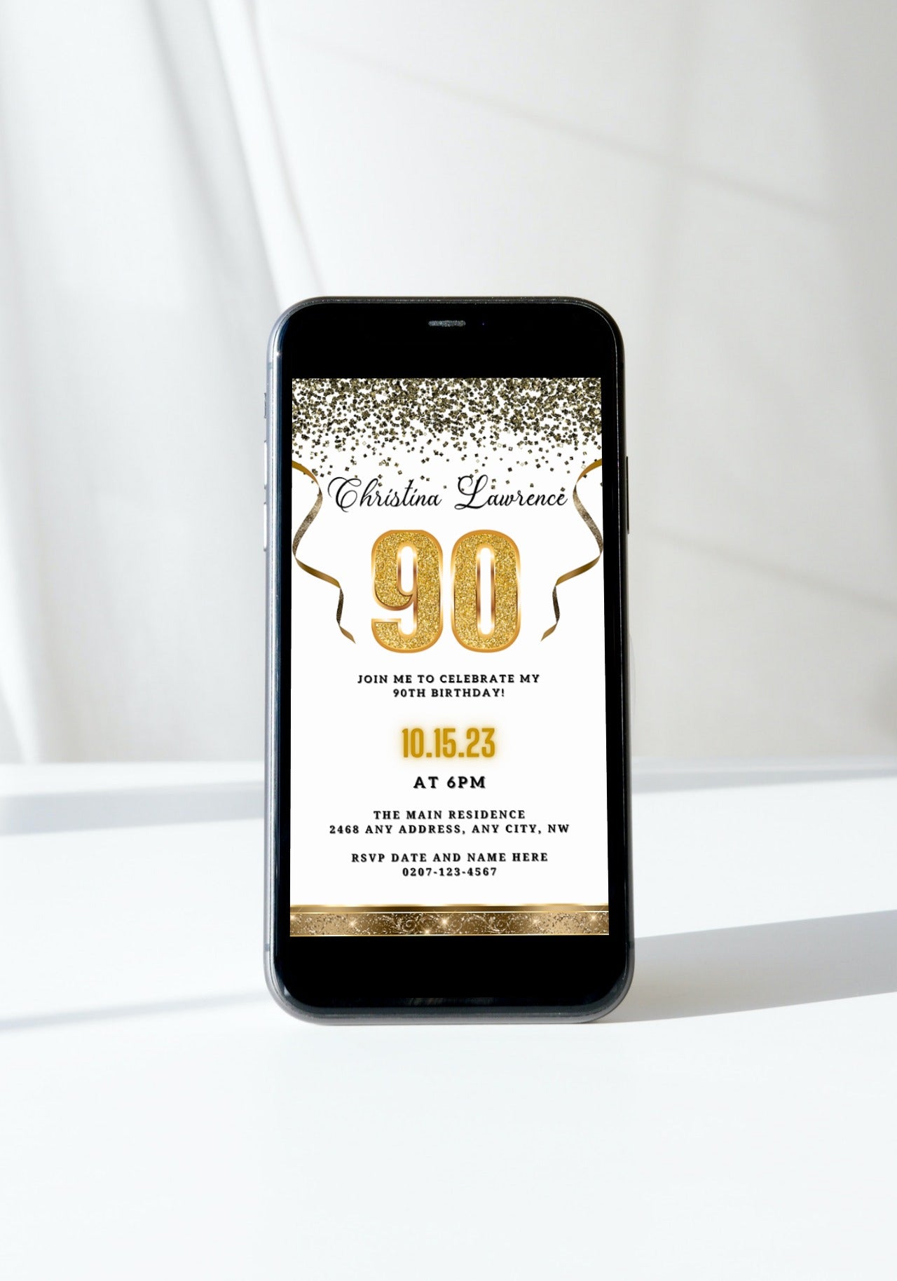 Customisable Digital White Gold Confetti 90th Birthday Evite displayed on smartphone screen with gold and white design elements.
