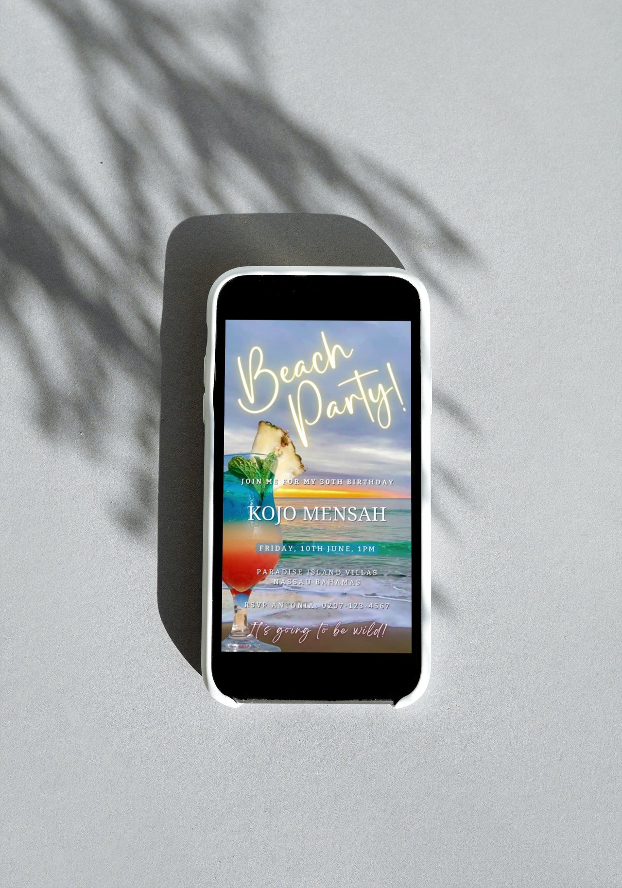 Smartphone displaying a customizable digital beach party video invitation with a cocktail image, available for personalizing and sharing via digital platforms.