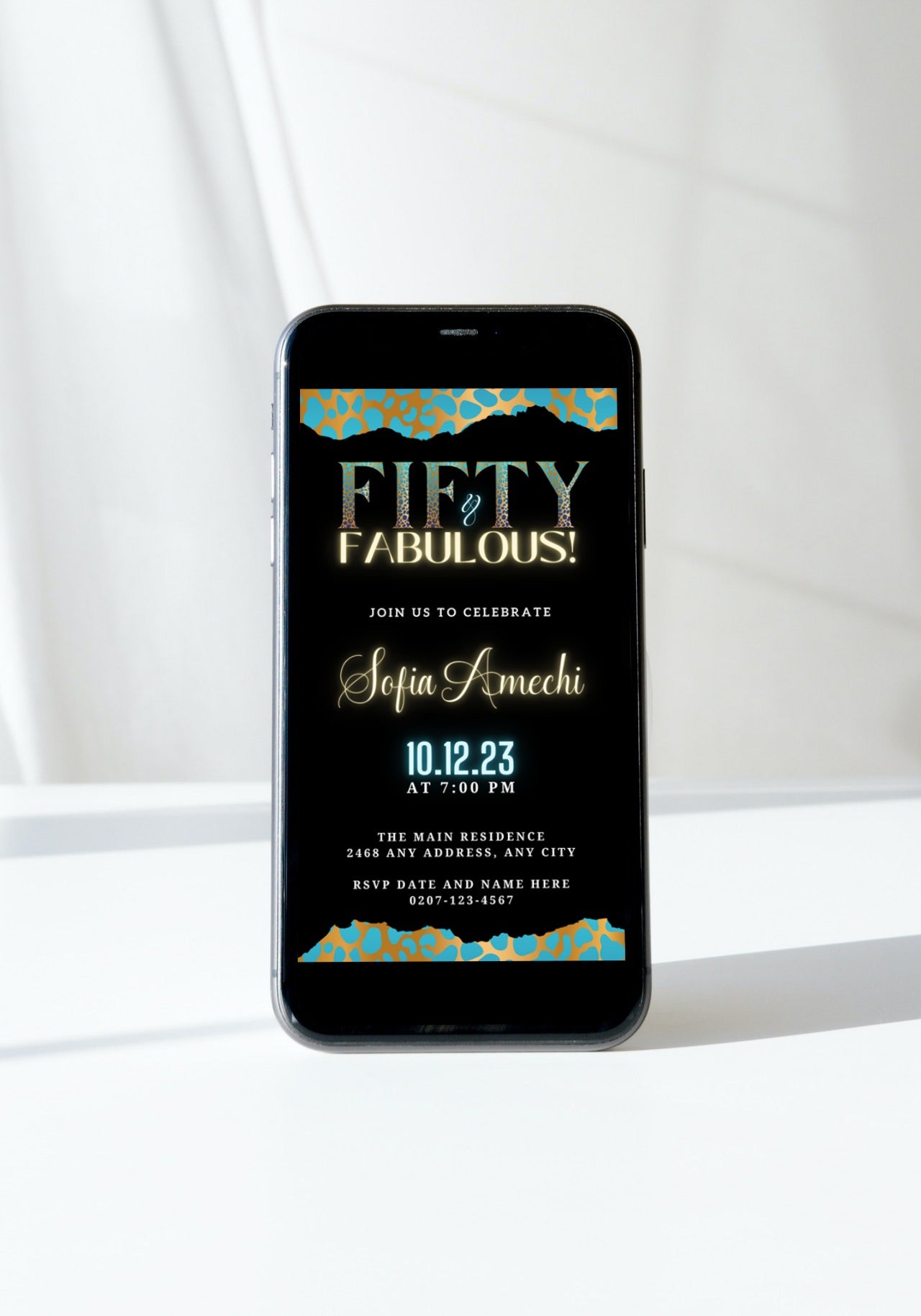 Cell phone displaying a customizable Teal Gold Cheetah Leopard | 50 & Fabulous Party Evite on a black screen, ready to personalize and send.