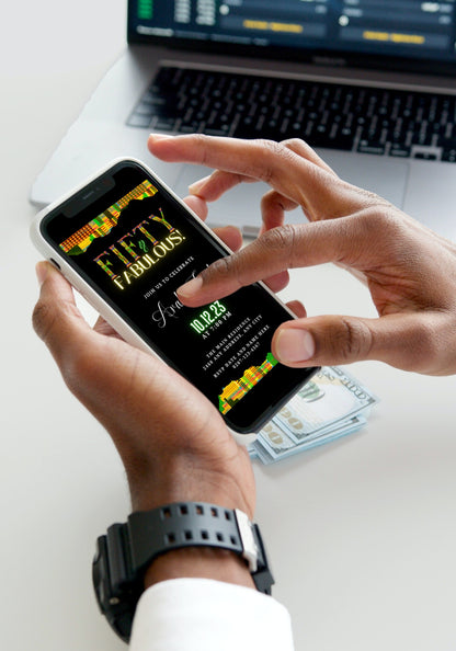 Person holding a smartphone displaying the customizable Green Yellow Kente Black | 50 & Fabulous Party Evite invitation template from URCordiallyInvited.