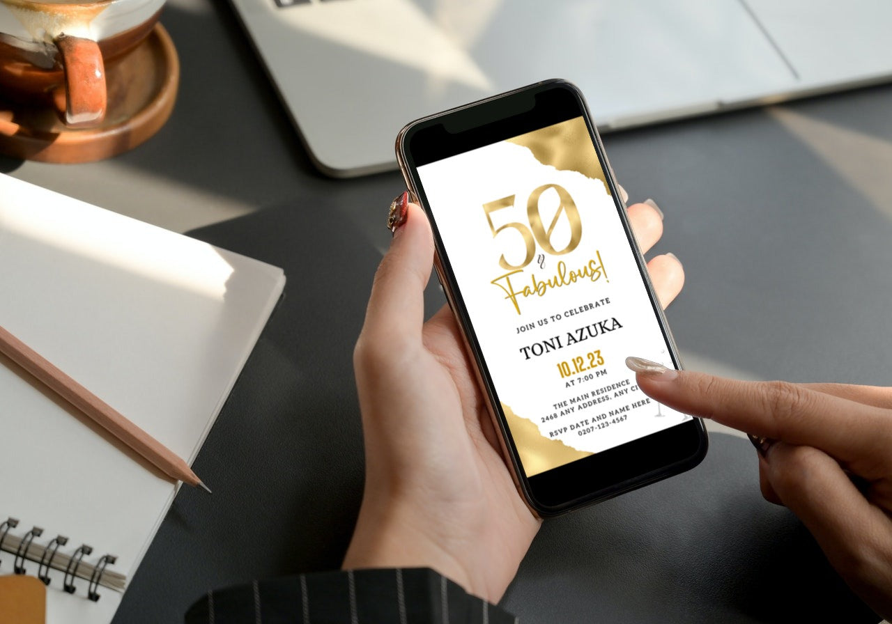 Person holding a smartphone displaying the customizable Gold White | 50 & Fabulous Party Evite template.