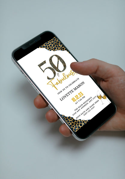 Hand holding a smartphone displaying the customizable Blue Gold Leopard | 50 & Fabulous Party Evite from URCordiallyInvited.