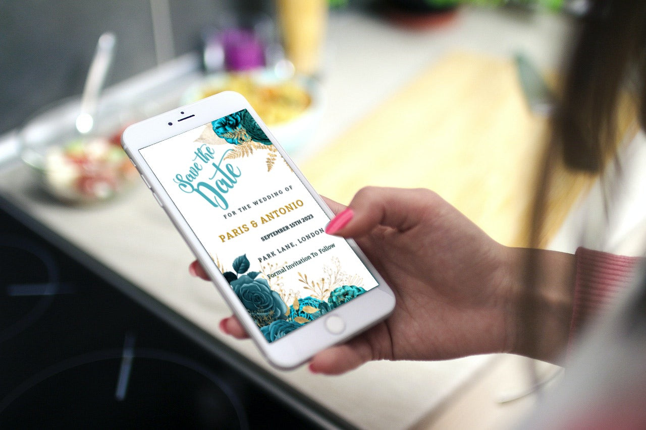 A hand holding a smartphone displaying a Teal Gold Floral Rustic Save The Date Wedding Evite template.