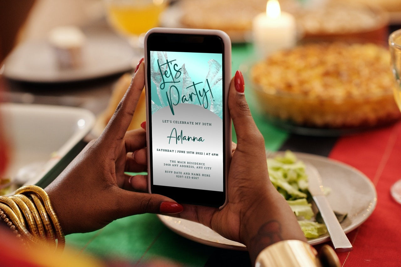 Person holding a smartphone displaying the Elegant Teal Silver Customisable Party Evite template.
