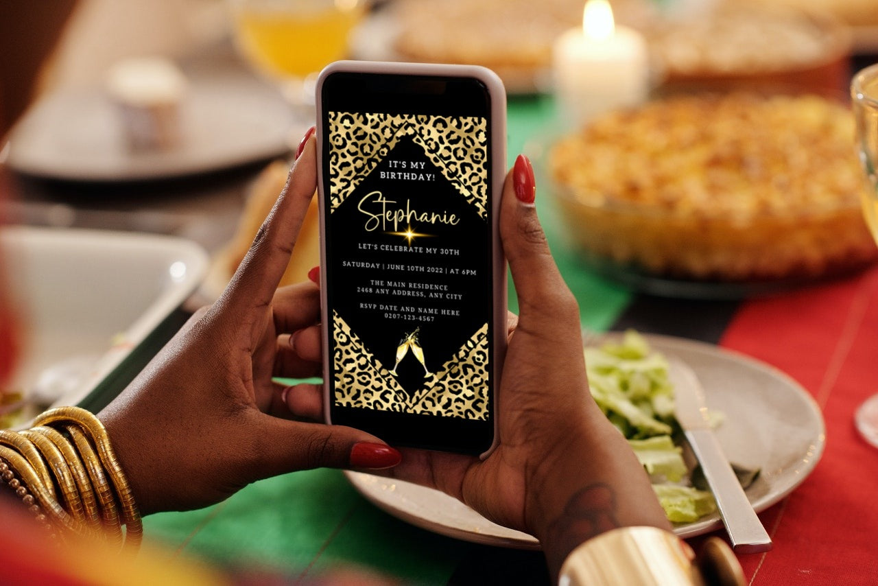 Person holding smartphone displaying Gold Black Leopard Animal Print Customisable Party Evite template for editing and sharing digitally via Canva.