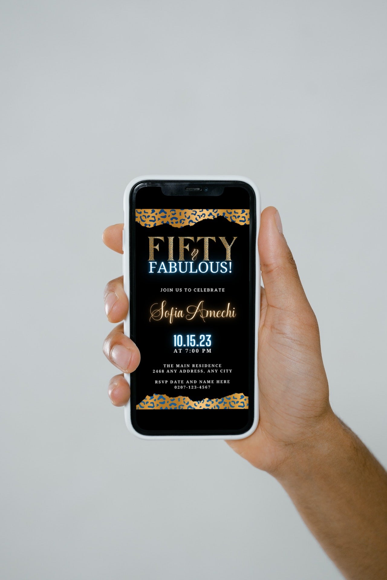 Hand holding a smartphone displaying a customisable Digital Gold Blue Black Leopard | 50 & Fabulous Party Evite template from URCordiallyInvited.