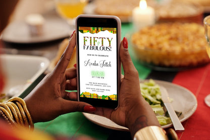 Person holding a smartphone displaying the customizable Green Yellow Kente White | 50 & Fabulous Party Evite template from URCordiallyInvited.