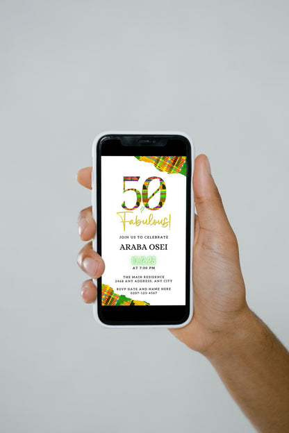 Hand holding a smartphone displaying a customizable Green Yellow Kente White | 50 & Fabulous Birthday Evite on a white screen.