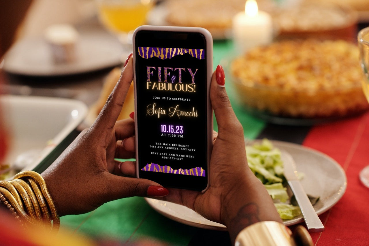 Person holding a phone displaying a customizable Neon Gold Purple Tiger | Fifty & Fabulous Party Evite template for digital invitations.