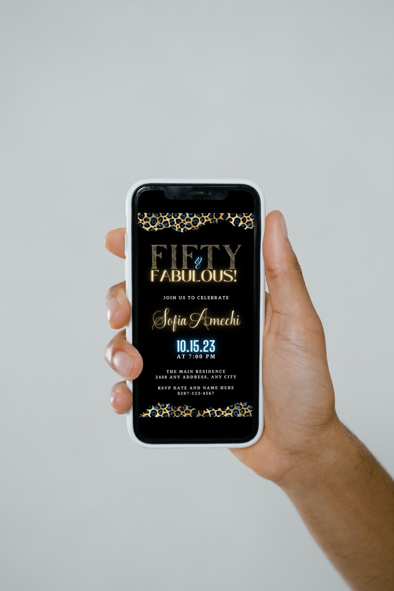Hand holding a smartphone displaying a customizable Gold Neon Blue Leopard | Fifty & Fabulous Party Evite from URCordiallyInvited.